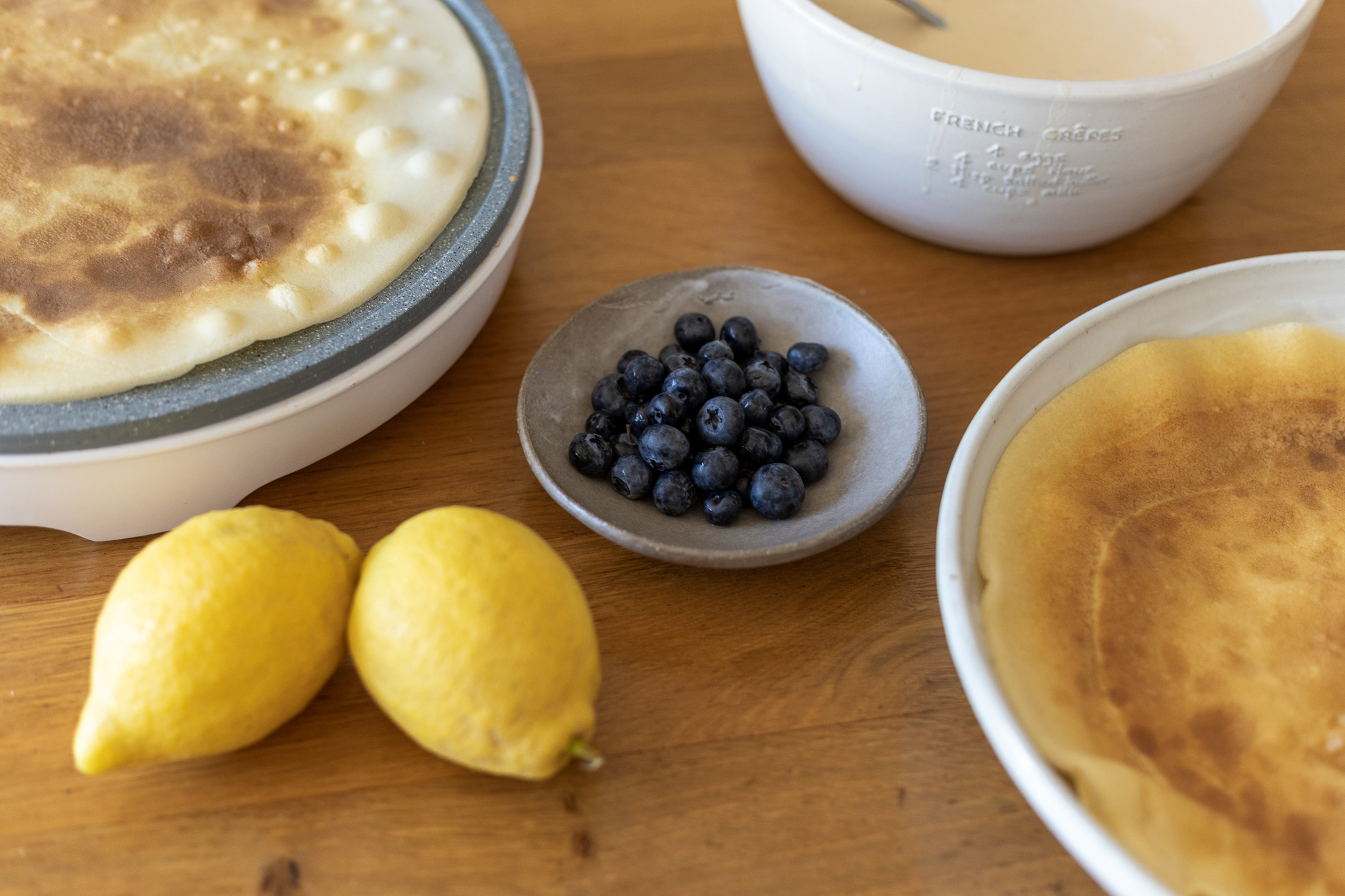 Crepe serving with lemon and blueberry